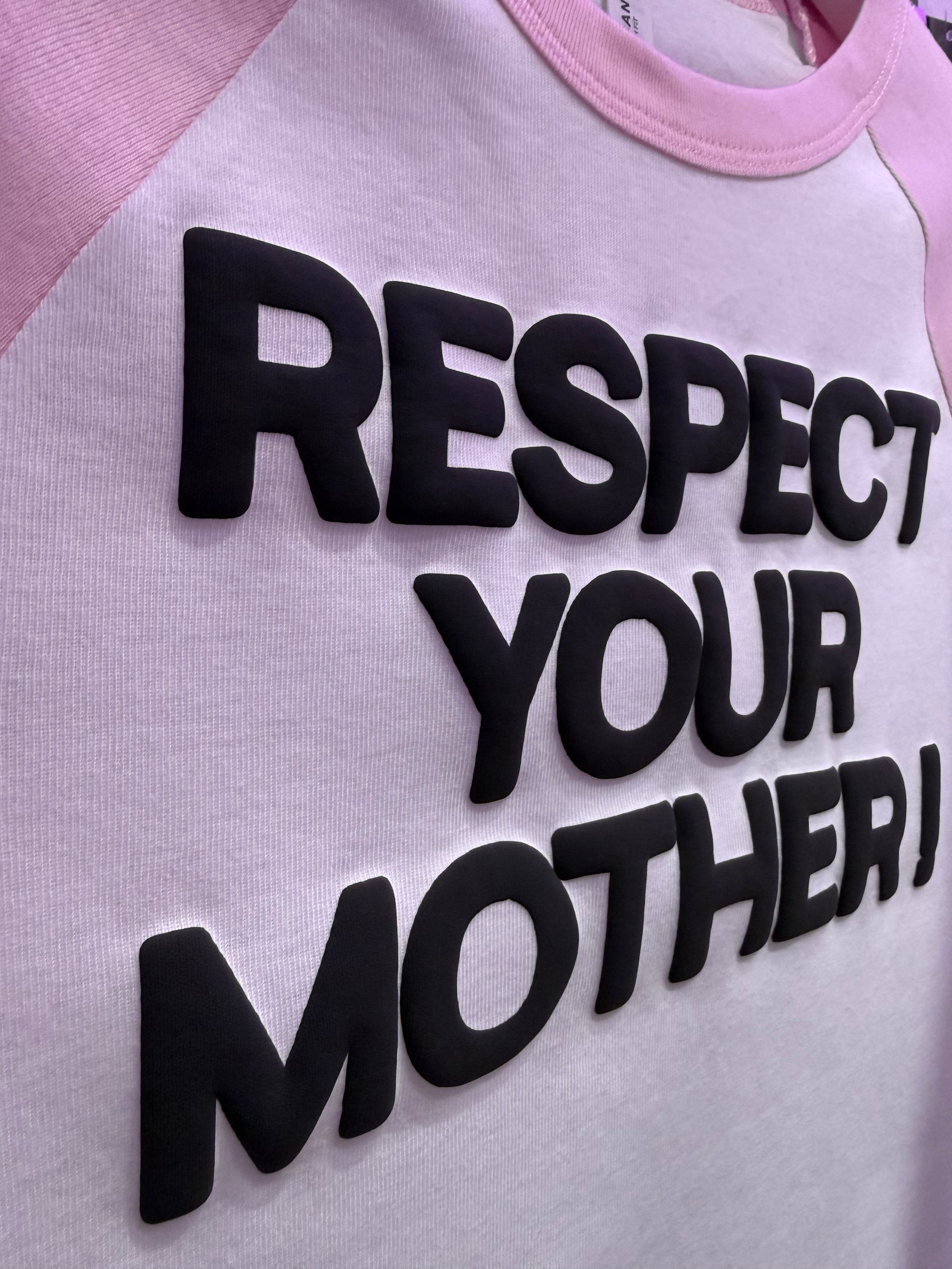 Pink and white shirt with 'RESPECT YOUR MOTHER!' text