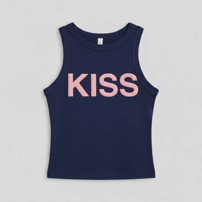 Navy blue tank top with 'KISS' printed in pink on a hanger against a reflective, multicolored background.