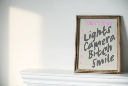 Lights camera bi*ch smile